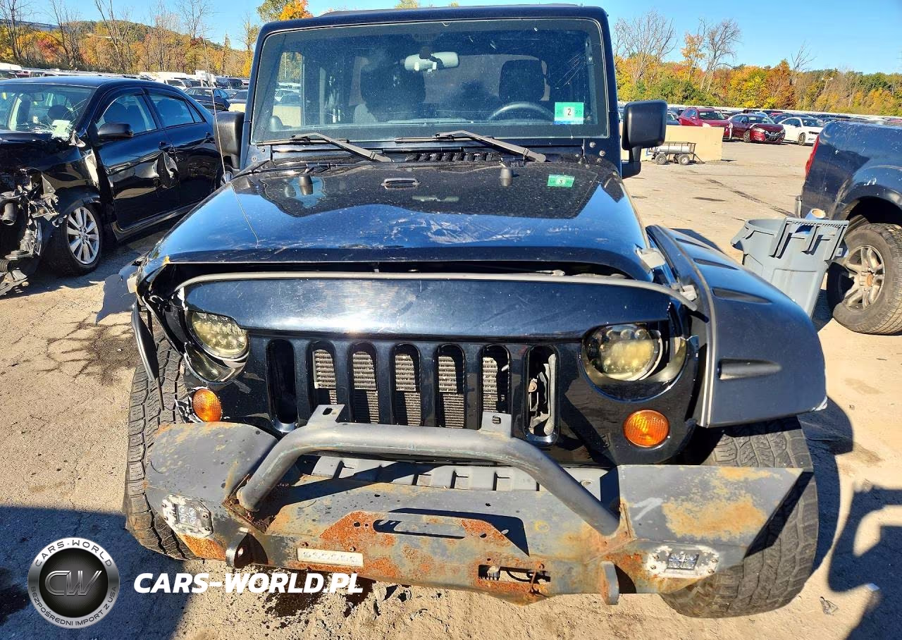2012 Jeep Wrangler Unlimited Sahara VIN:1C4BJWEG9CL133325 - 5