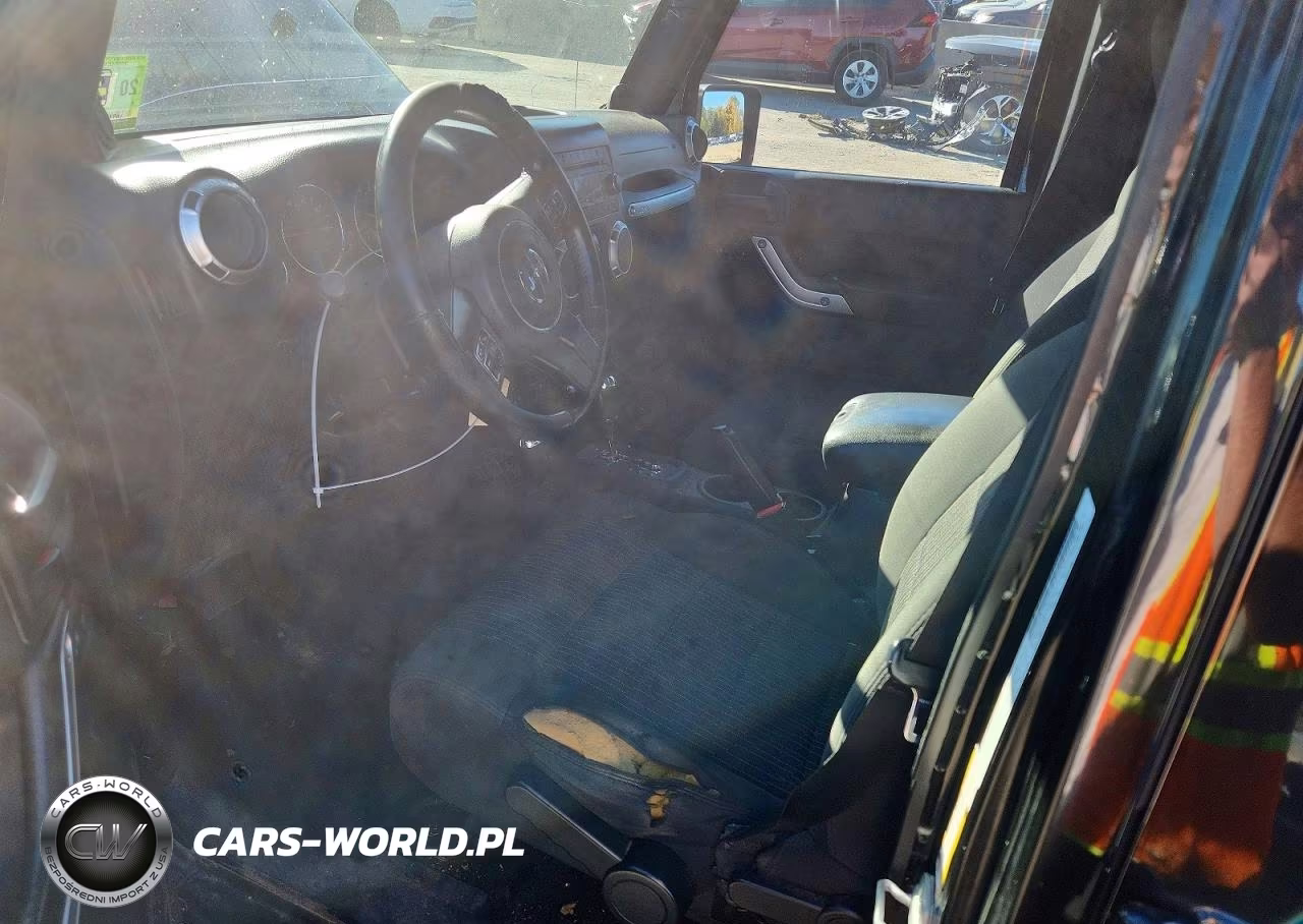 2012 Jeep Wrangler Unlimited Sahara VIN:1C4BJWEG9CL133325 - 8