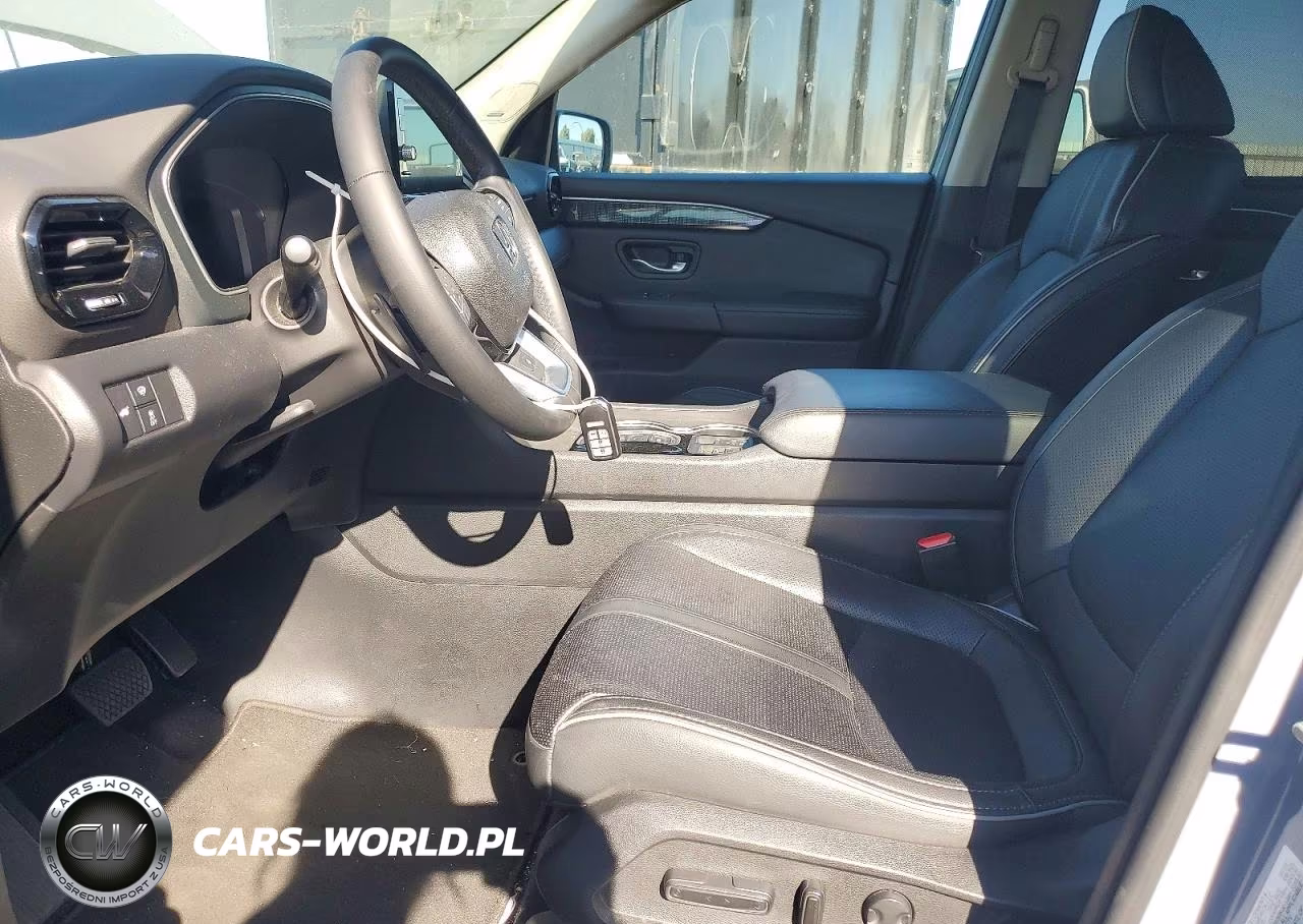 2023 Honda Pilot Elite VIN:5FNYG1H87PB041235 - 7