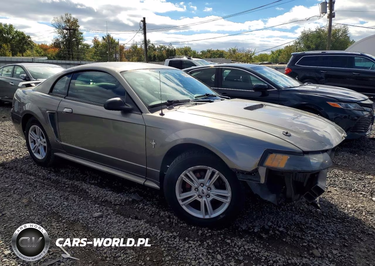 2002 Ford Mustang VIN:1FAFP40402F125697 - 4