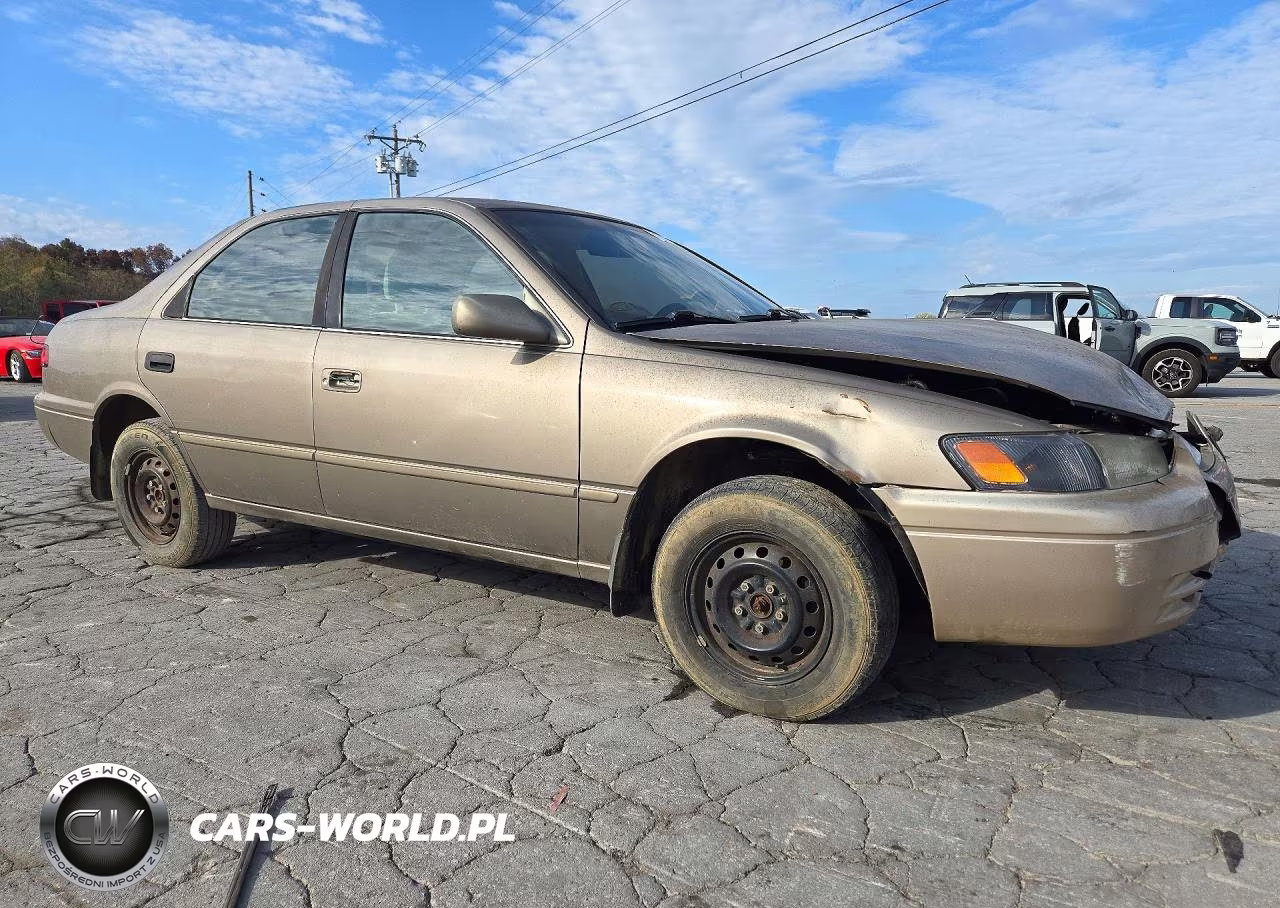 1999 Toyota Camry Ce VIN:4T1BG22K3XU565064 - 4