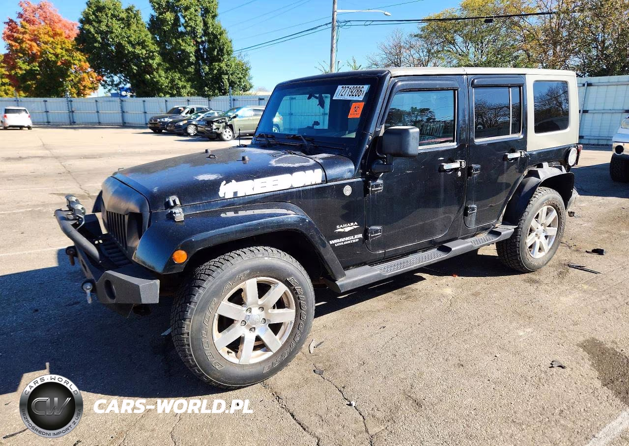 2009 Jeep Wrangler Unlimited Sahara VIN:1J4GA59169L721157 - 1