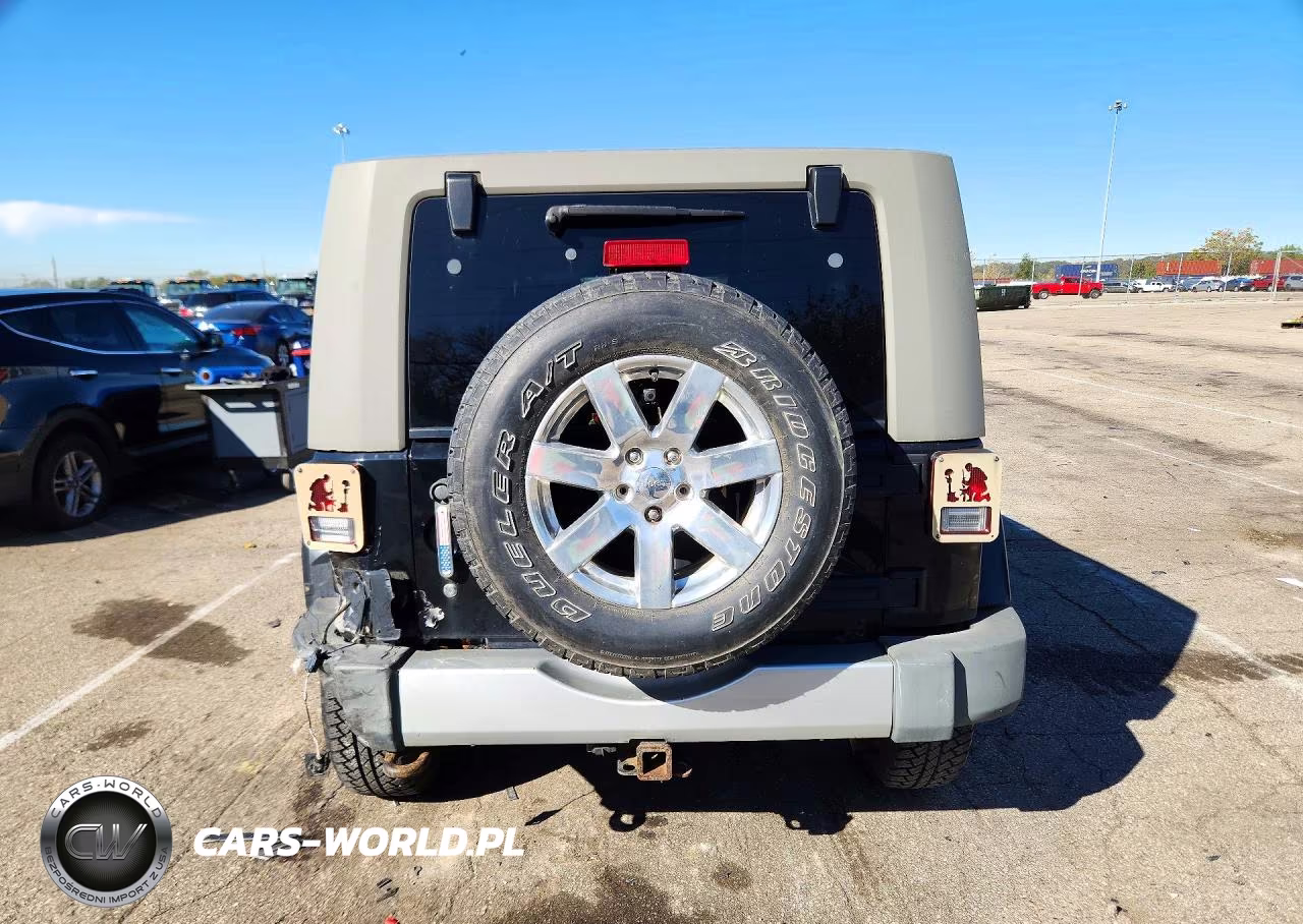2009 Jeep Wrangler Unlimited Sahara VIN:1J4GA59169L721157 - 6