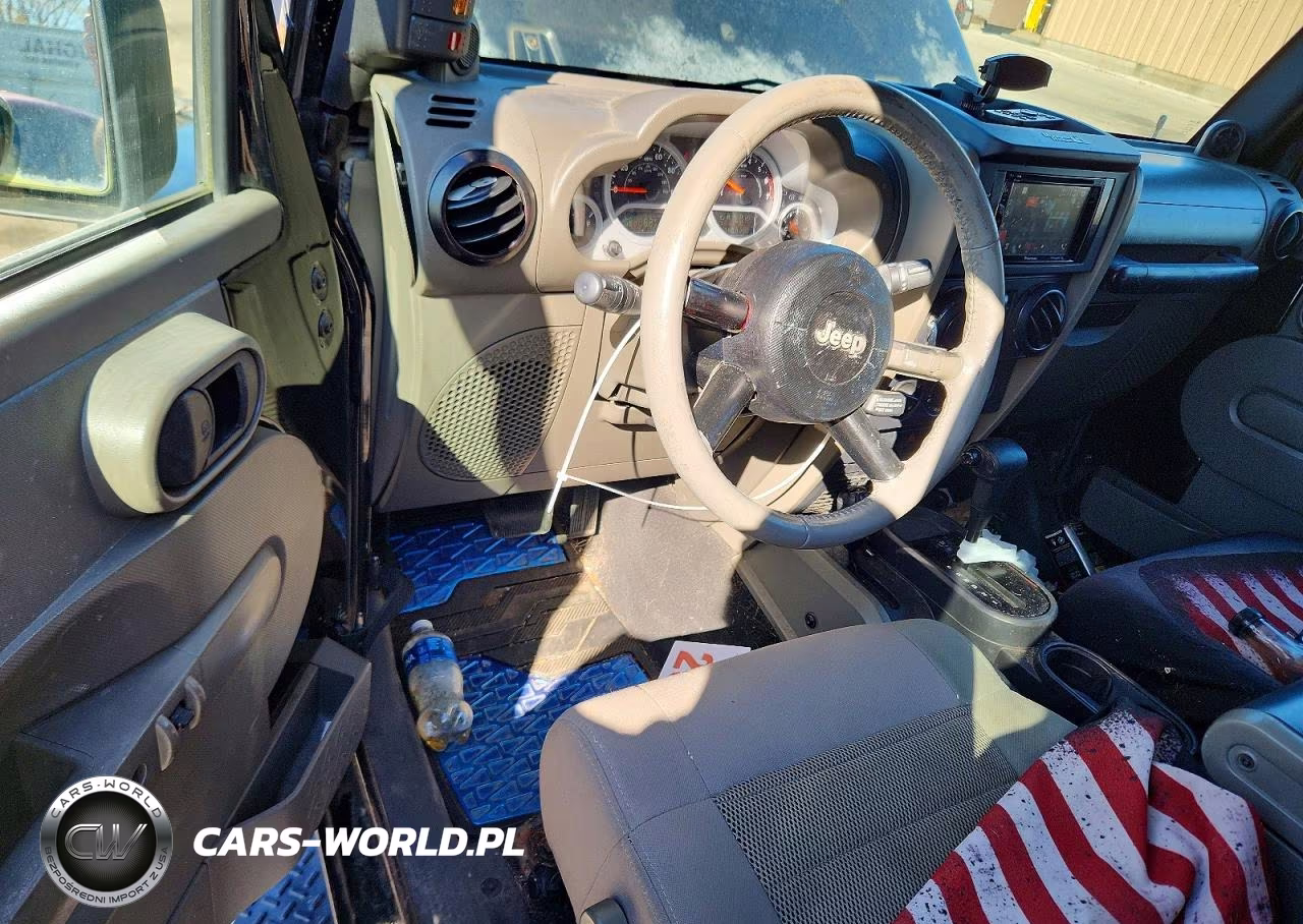 2009 Jeep Wrangler Unlimited Sahara VIN:1J4GA59169L721157 - 8