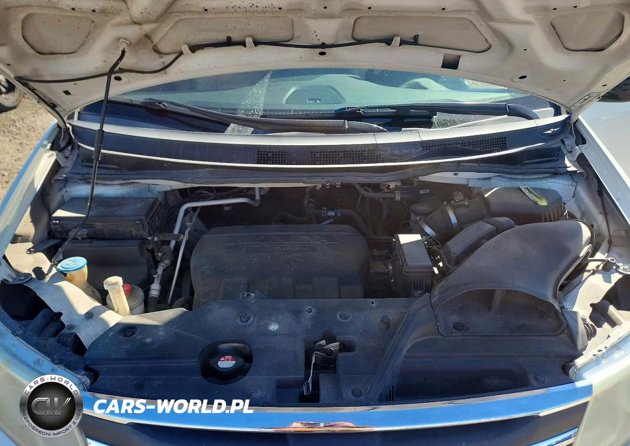 2011 Honda Odyssey Touring VIN:5FNRL5H96BB065843 - 12