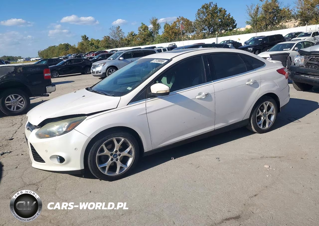 2012 Ford Focus VIN:1FAHP3J27CL173958 - 1