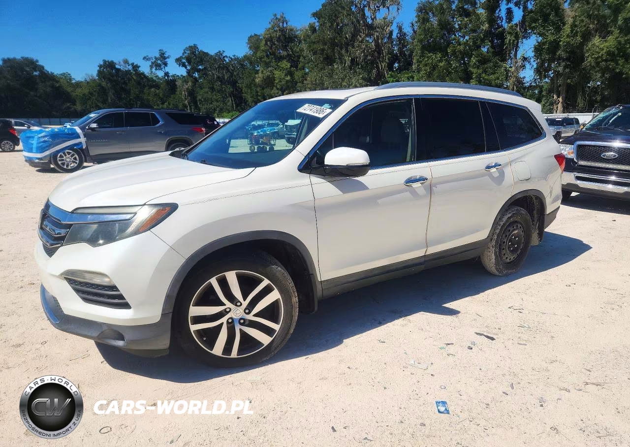 2016 Honda Pilot Touring VIN:5FNYF5H90GB023341 - 1