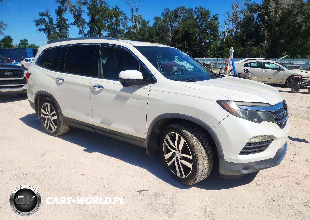 2016 Honda Pilot Touring VIN:5FNYF5H90GB023341 - 4