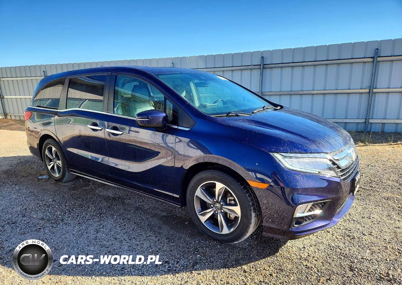 2019 Honda Odyssey Touring VIN:5FNRL6H85KB100658 - 4