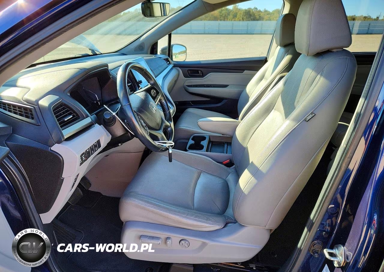 2019 Honda Odyssey Touring VIN:5FNRL6H85KB100658 - 7