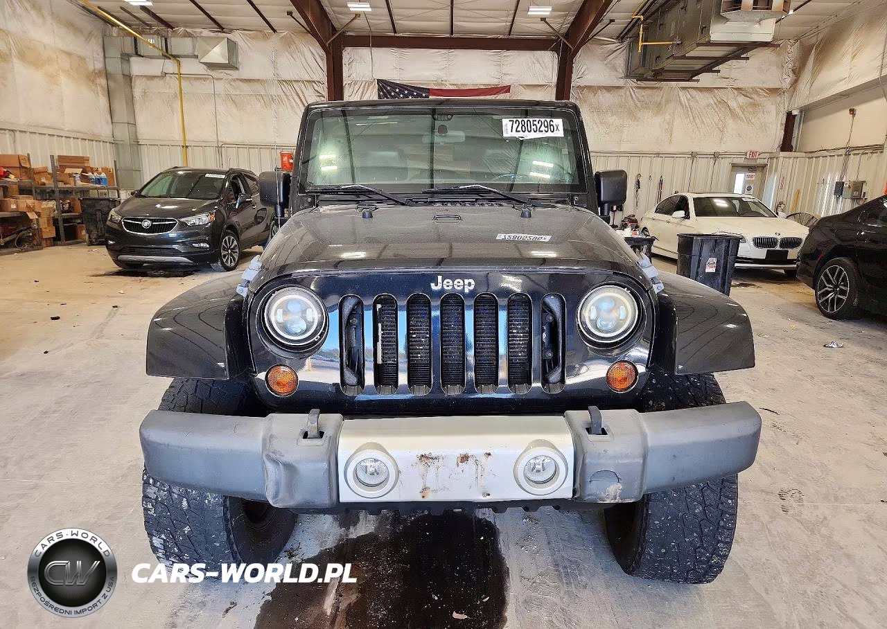 2012 Jeep Wrangler Unlimited Sahara VIN:1C4HJWEG4CL240891 - 5