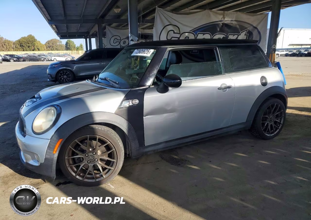 2009 Mini Cooper S VIN:WMWMF73579TX40962 - 1