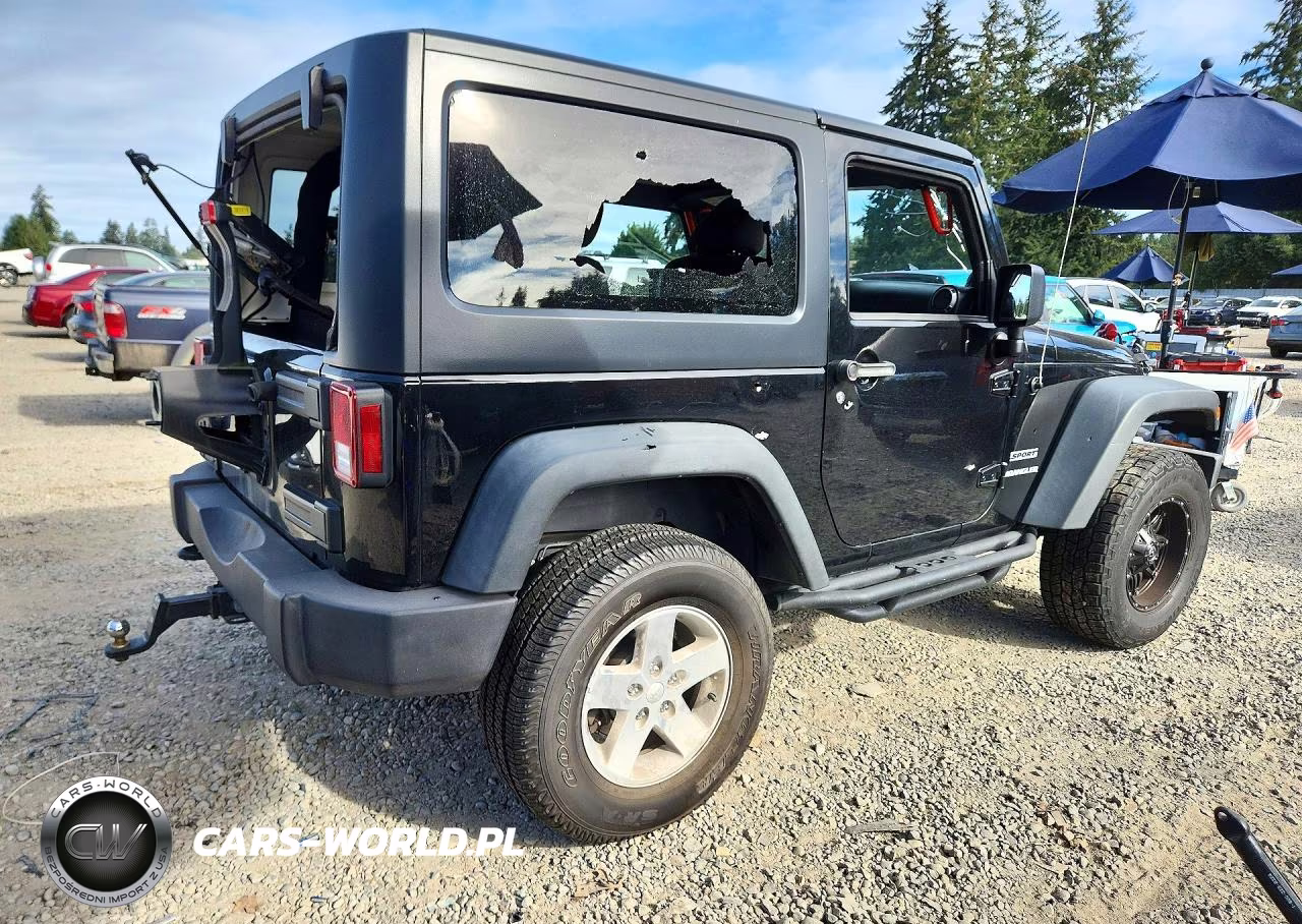 2012 Jeep Wrangler Sport VIN:1C4AJWAG6CL253844 - 3