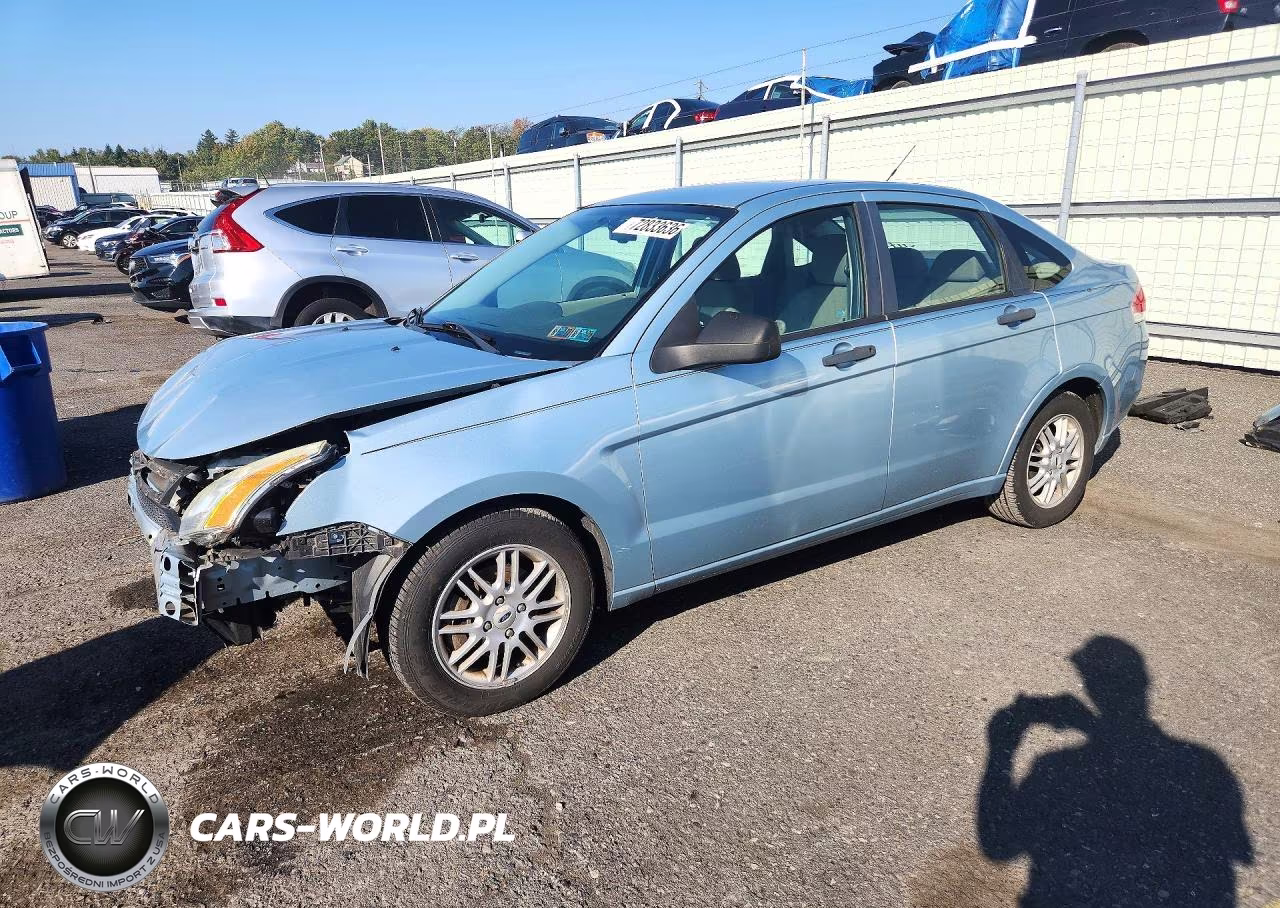 2009 Ford Focus Se VIN:1FAHP35N79W101752 - 1