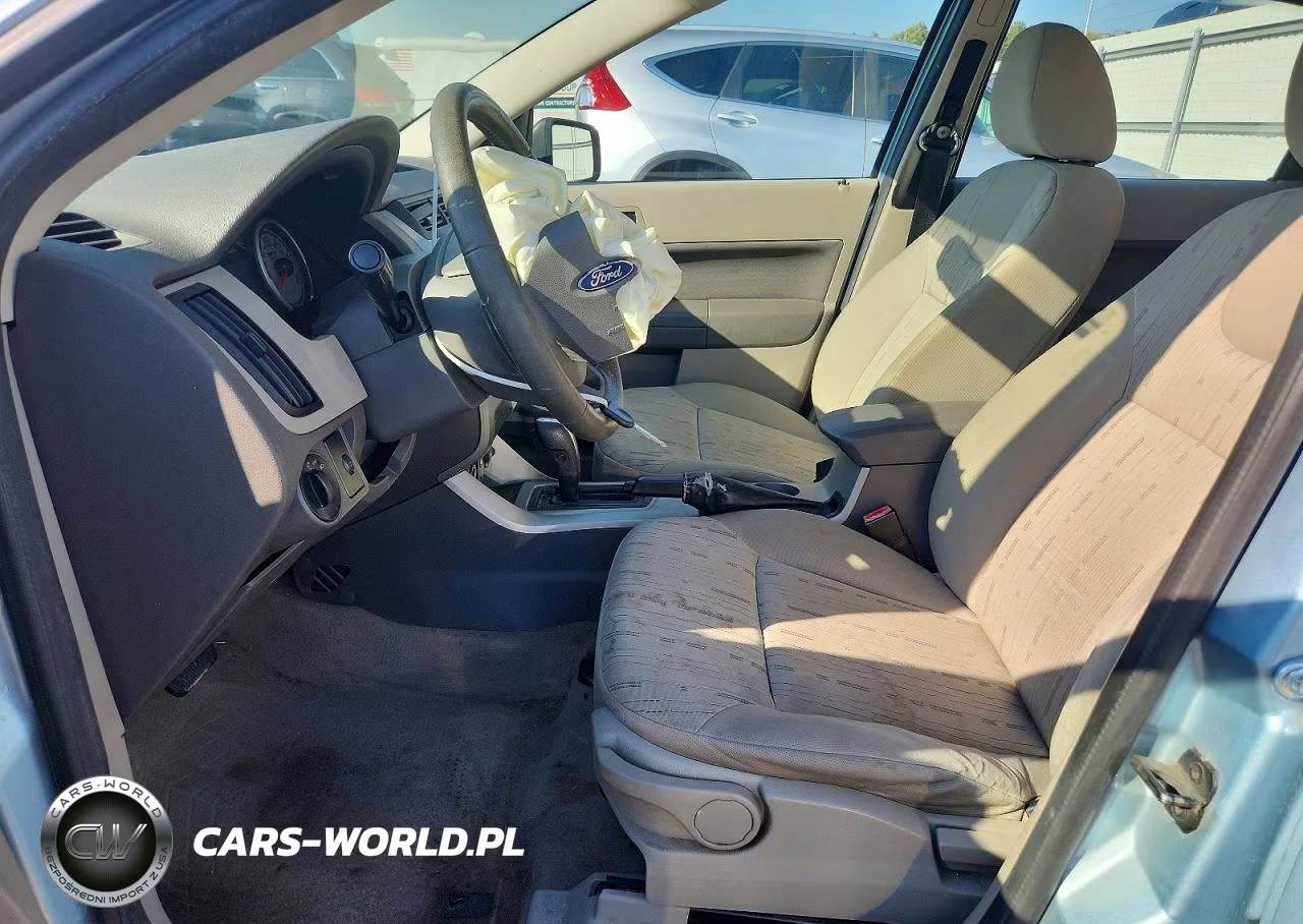 2009 Ford Focus Se VIN:1FAHP35N79W101752 - 7