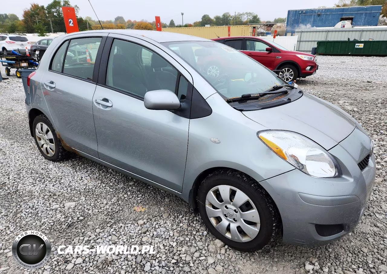 2009 Toyota Yaris Base VIN:JTDKT903995244017 - 4