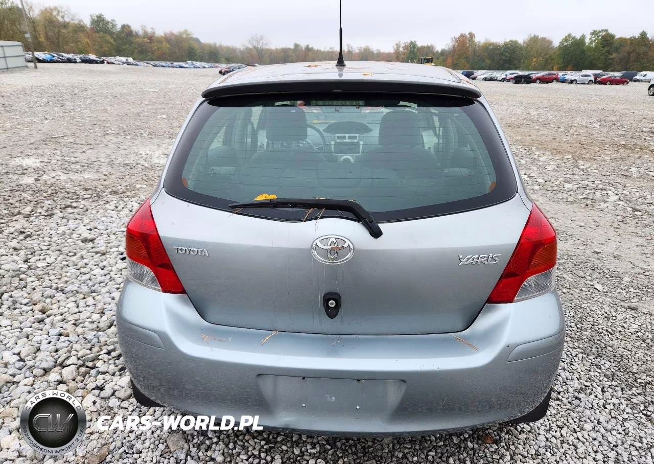 2009 Toyota Yaris Base VIN:JTDKT903995244017 - 6