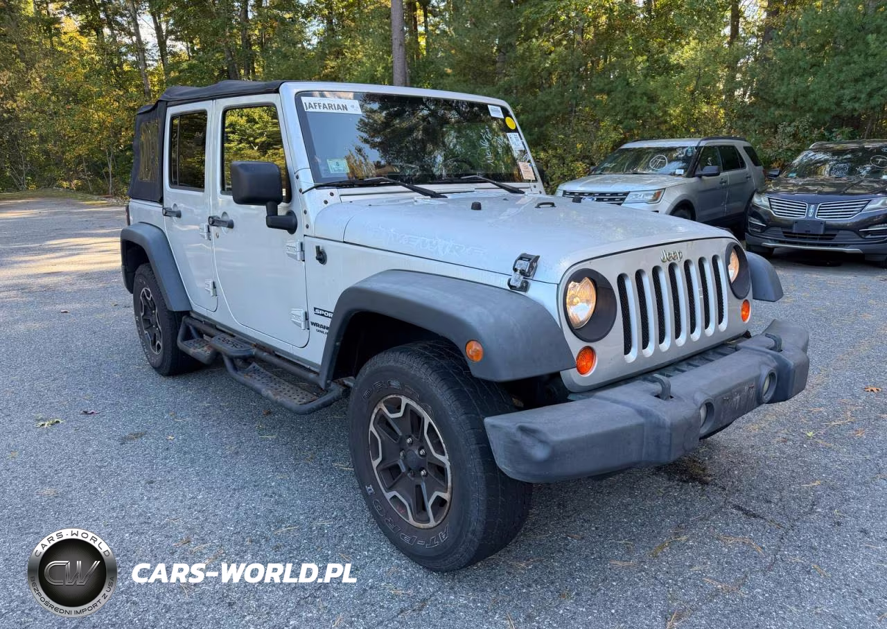 2010 Jeep Wrangler Unlimited Sport VIN:1J4BB3H11AL142174 - 1