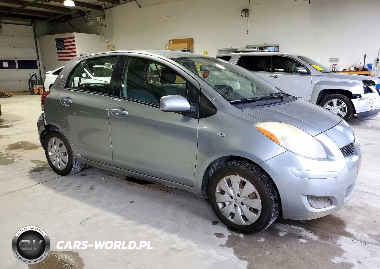 2010 Toyota Yaris Base VIN:JTDKT4K31A5320690 - 4