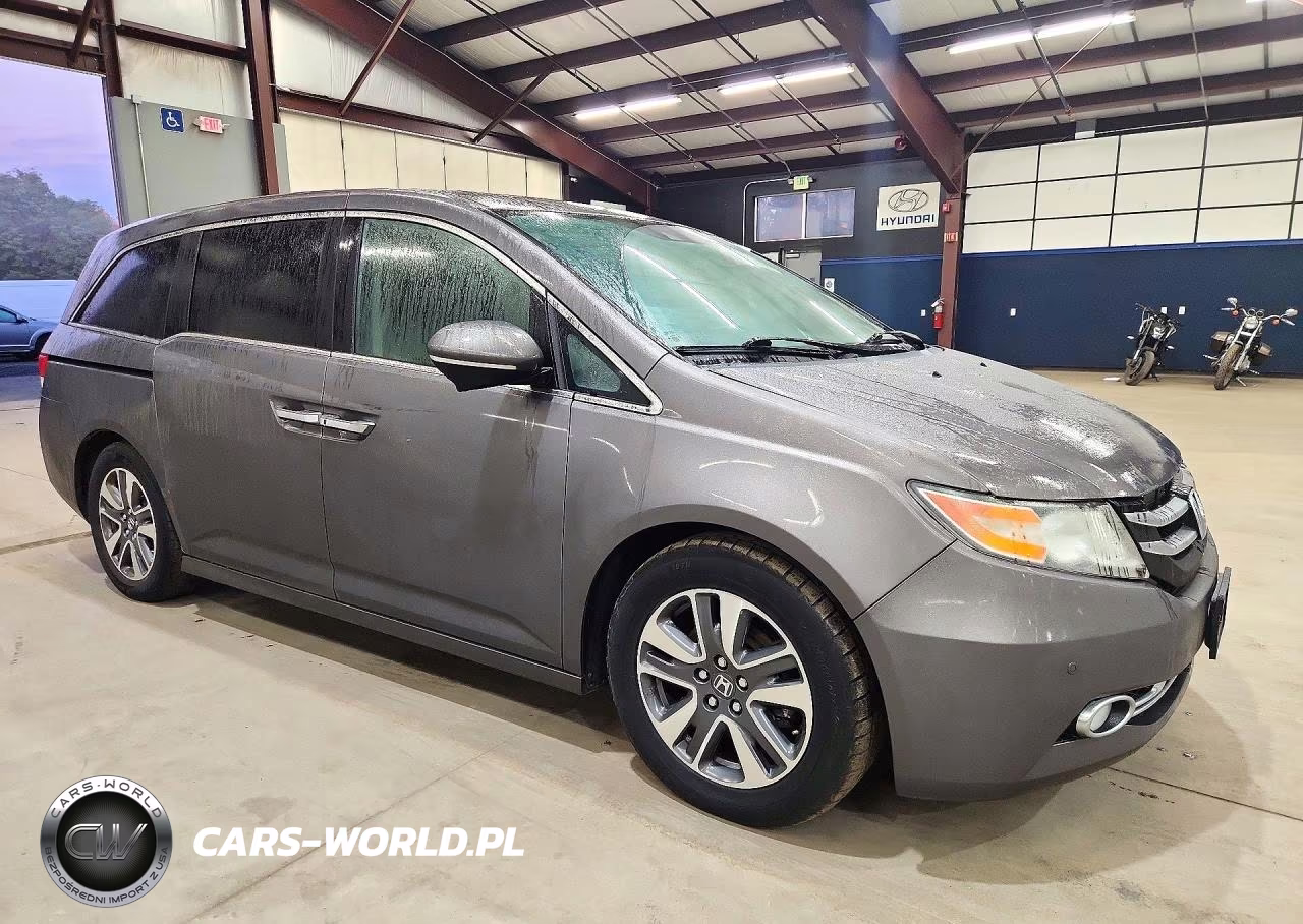 2016 Honda Odyssey Touring VIN:5FNRL5H94GB041662 - 4