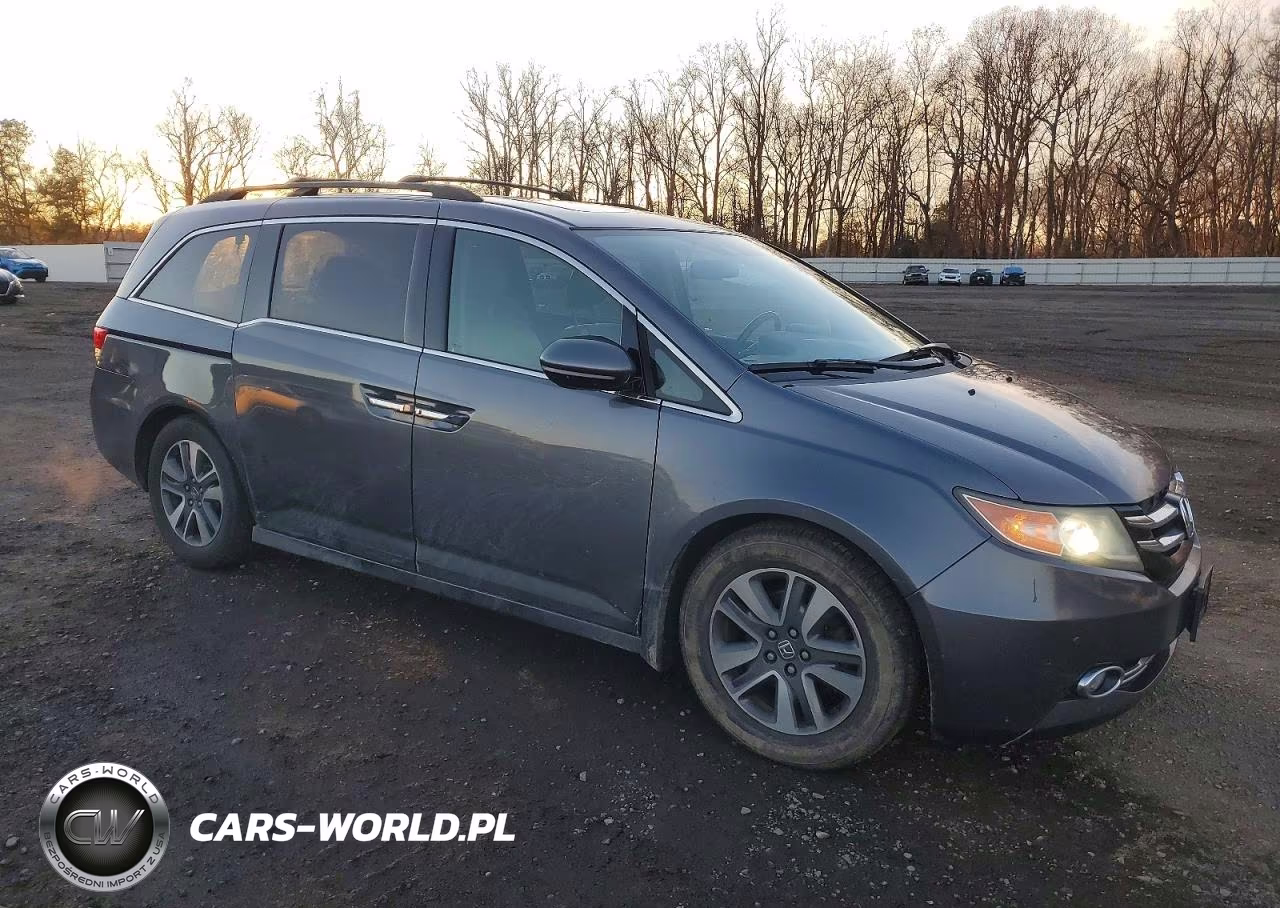 2014 Honda Odyssey Touring VIN:5FNRL5H92EB136461 - 4
