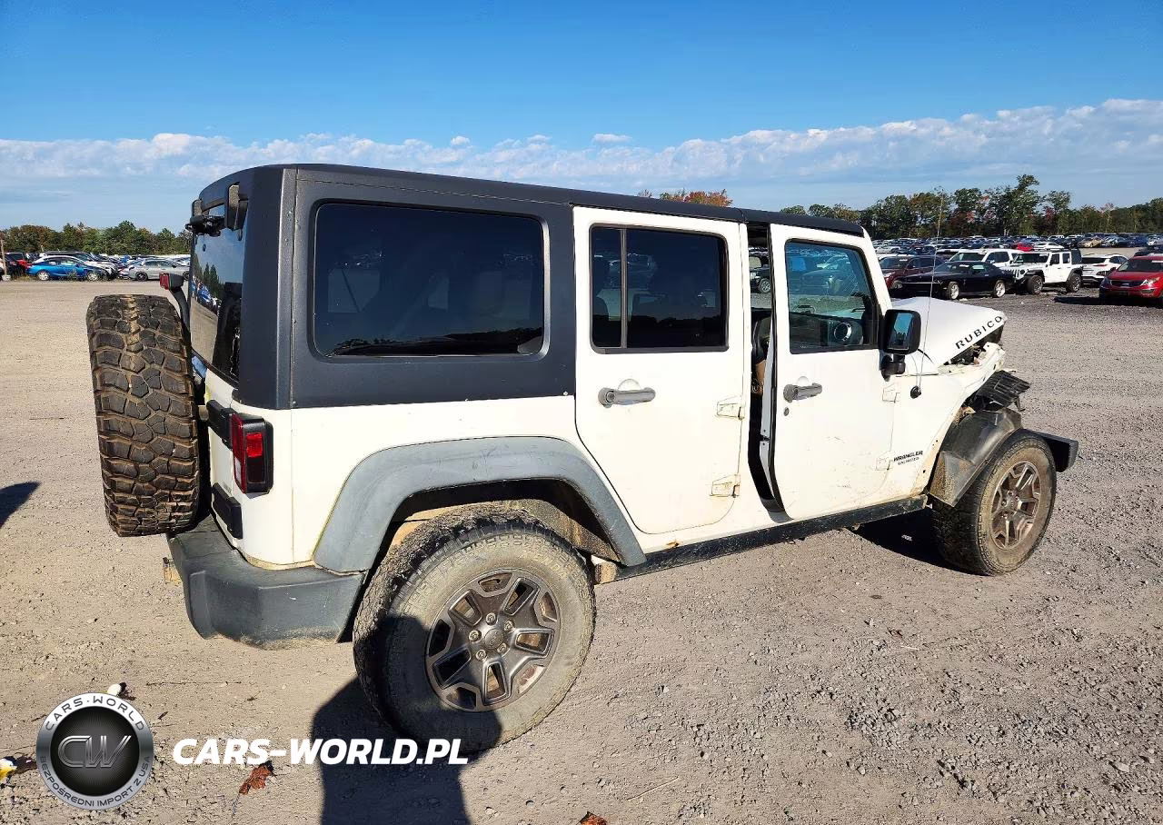 2012 Jeep Wrangler Unlimited Rubicon VIN:1C4HJWFGXCL123895 - 3