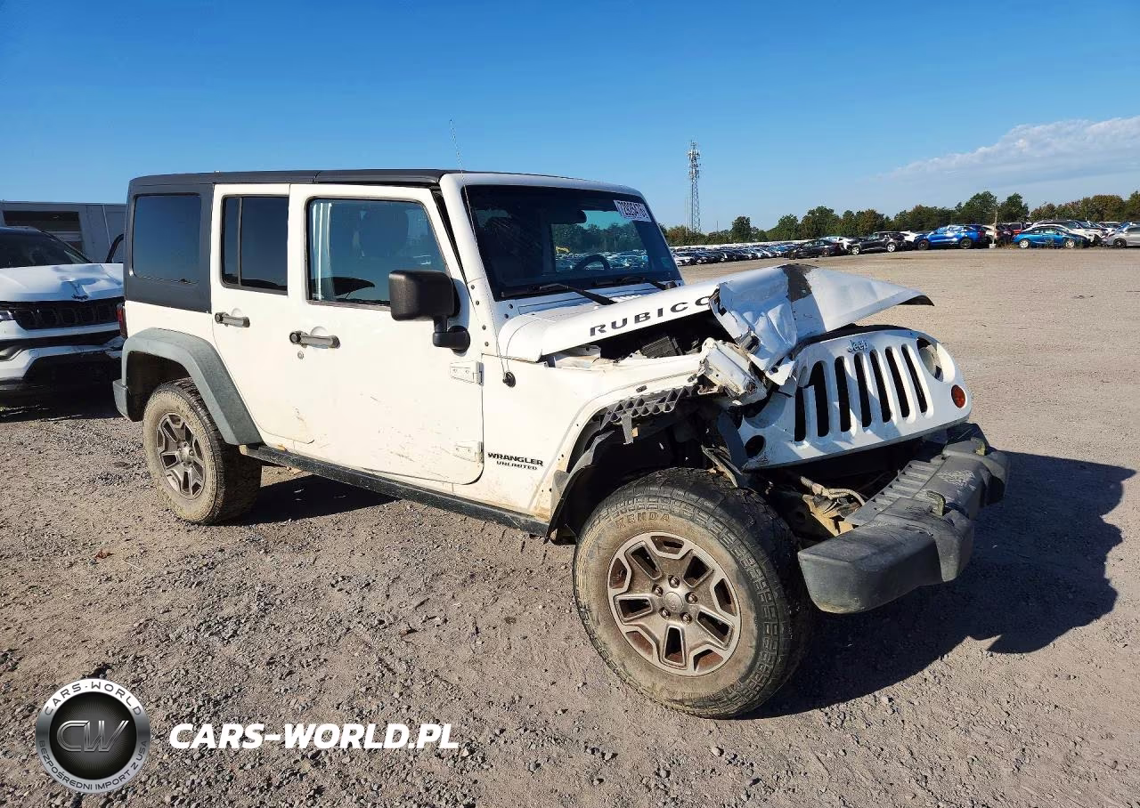 2012 Jeep Wrangler Unlimited Rubicon VIN:1C4HJWFGXCL123895 - 4