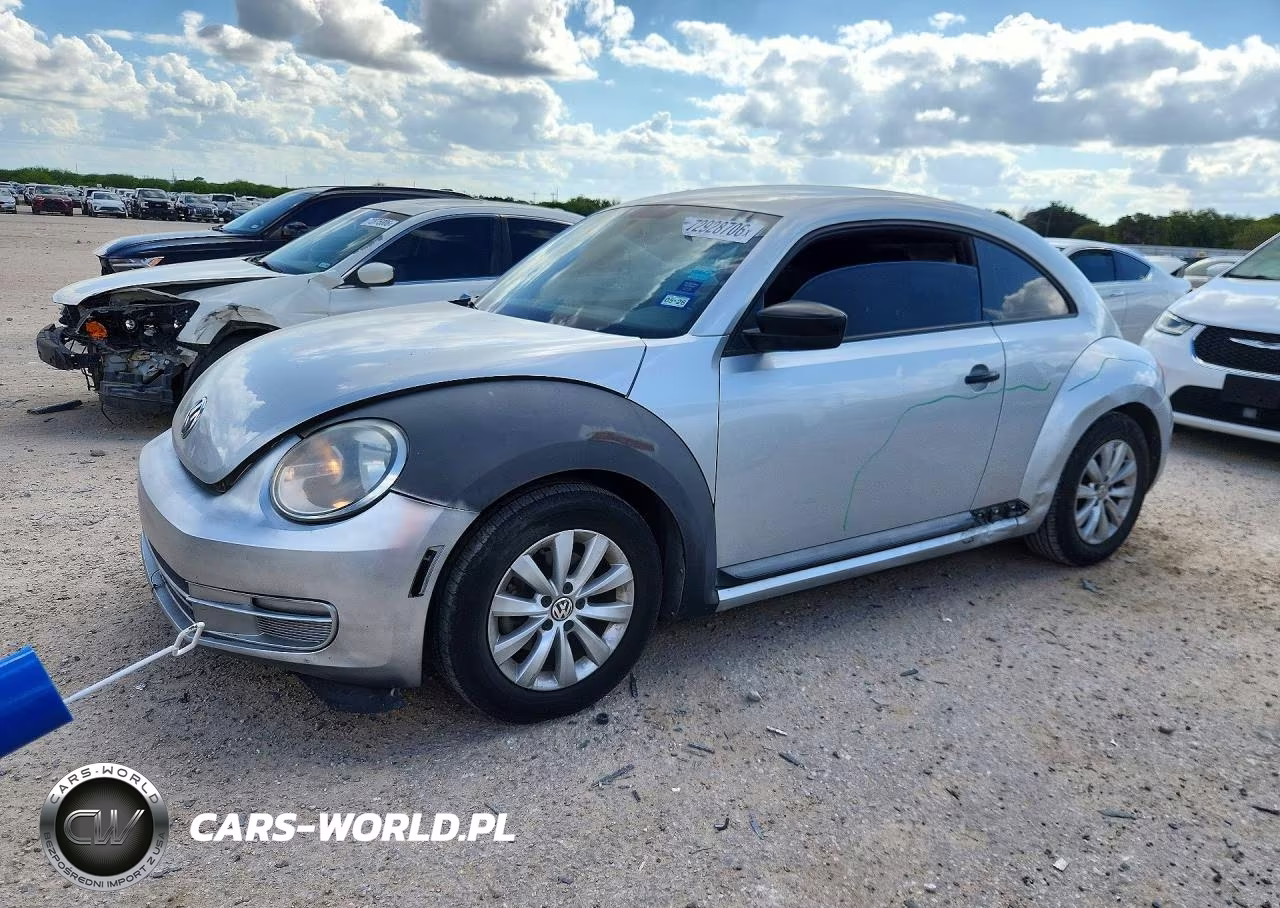 2014 Volkswagen Beetle VIN:3VWFP7AT0EM623420 - 1