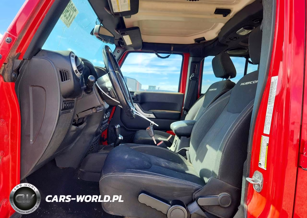 2014 Jeep Wrangler Unlimited Rubicon VIN:1C4BJWFG7EL325828 - 7