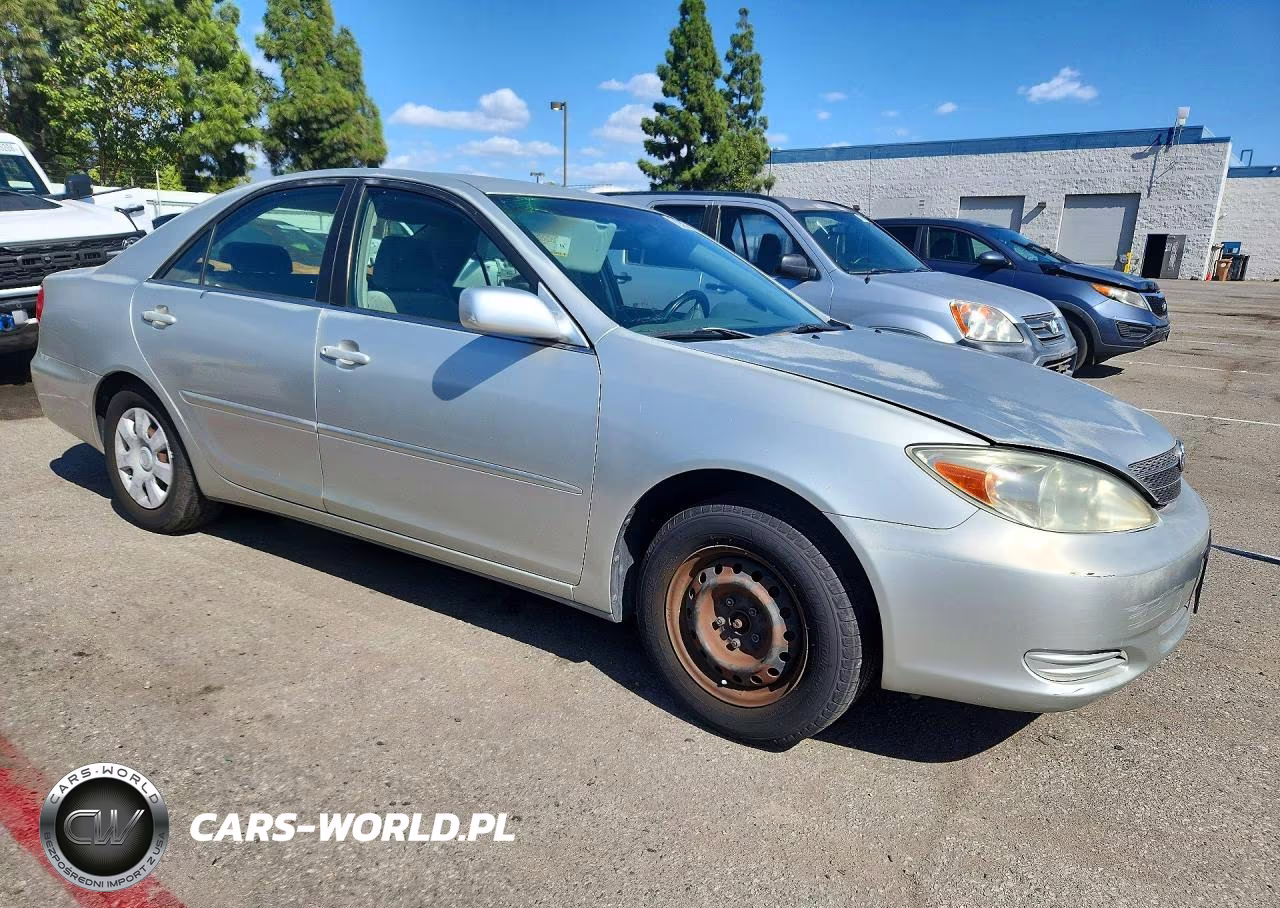 2003 Toyota Camry Le VIN:JTDBE32K430153690 - 4