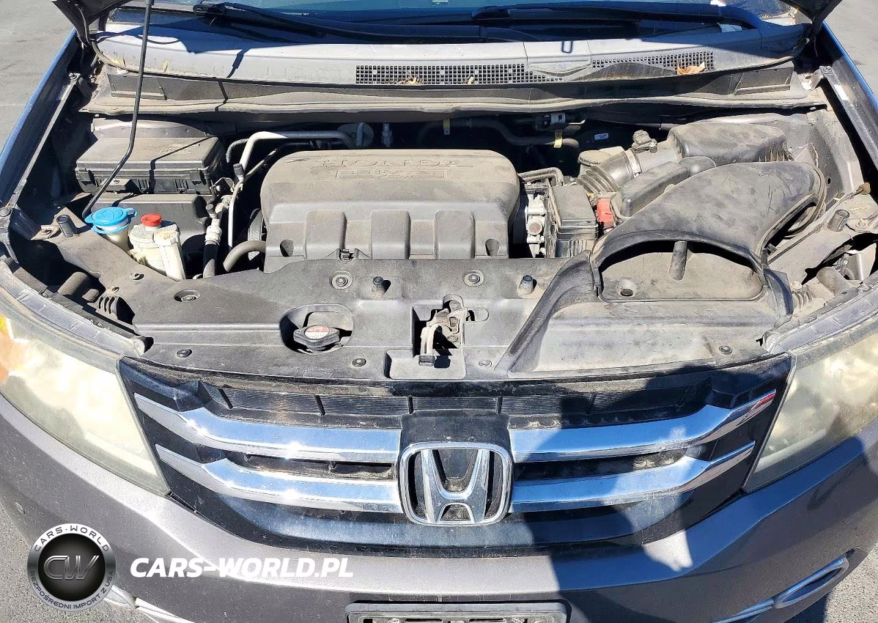 2014 Honda Odyssey Touring VIN:5FNRL5H90EB061310 - 12