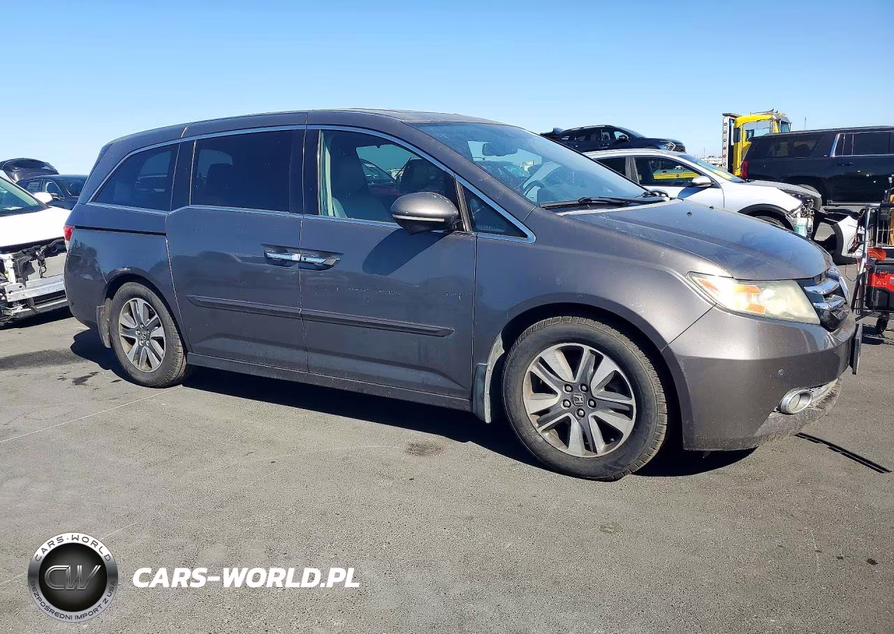 2014 Honda Odyssey Touring VIN:5FNRL5H90EB061310 - 4