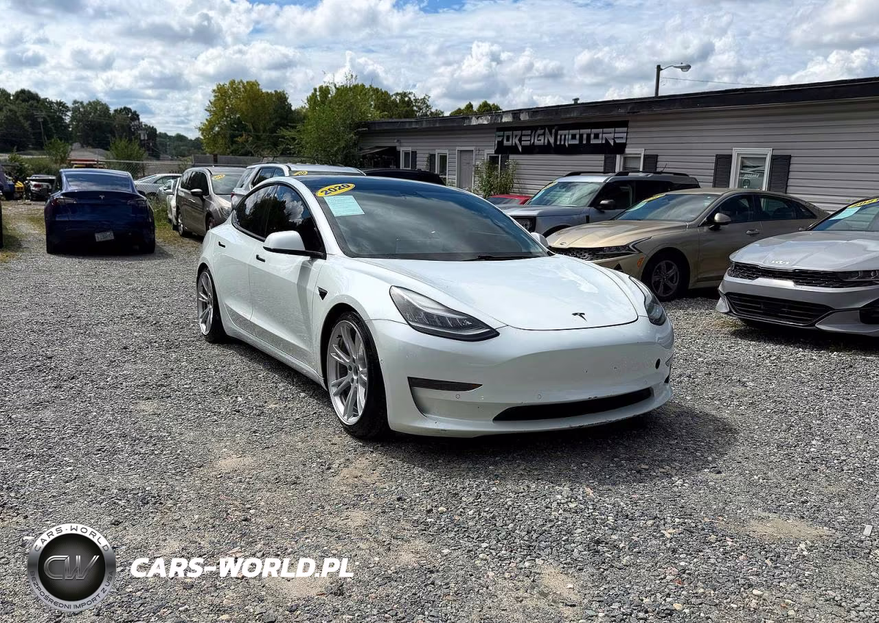 2020 Tesla Model 3 VIN:5YJ3E1EC1LF715057 - 1