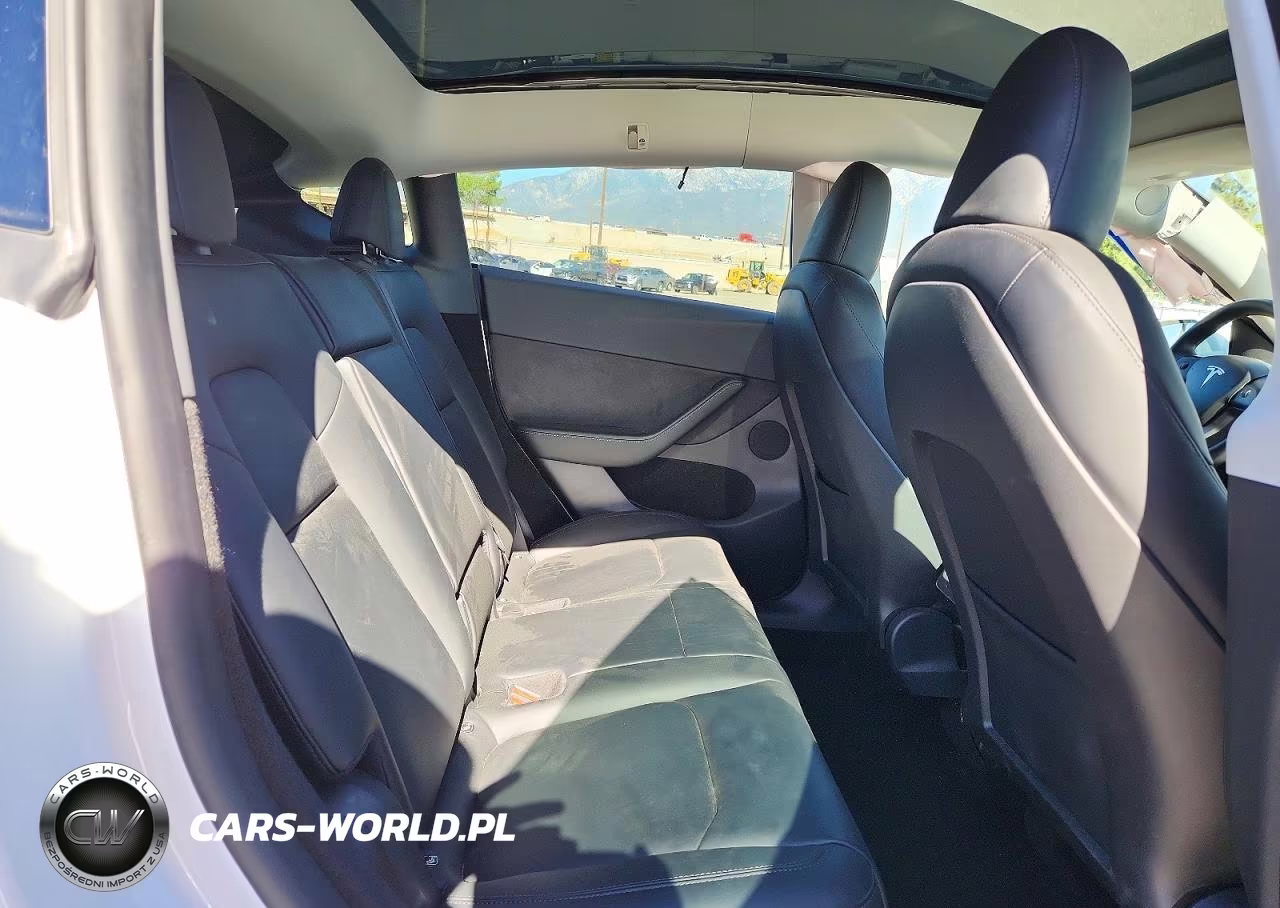 2023 Tesla Model Y VIN:7SAYGDEE0PA030105 - 11