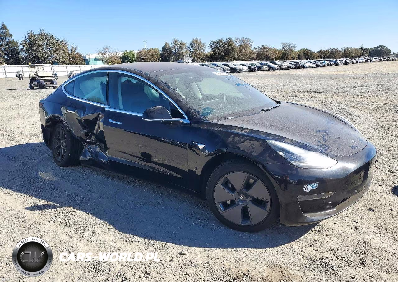 2018 Tesla Model 3 VIN:5YJ3E1EAXJF040658 - 4