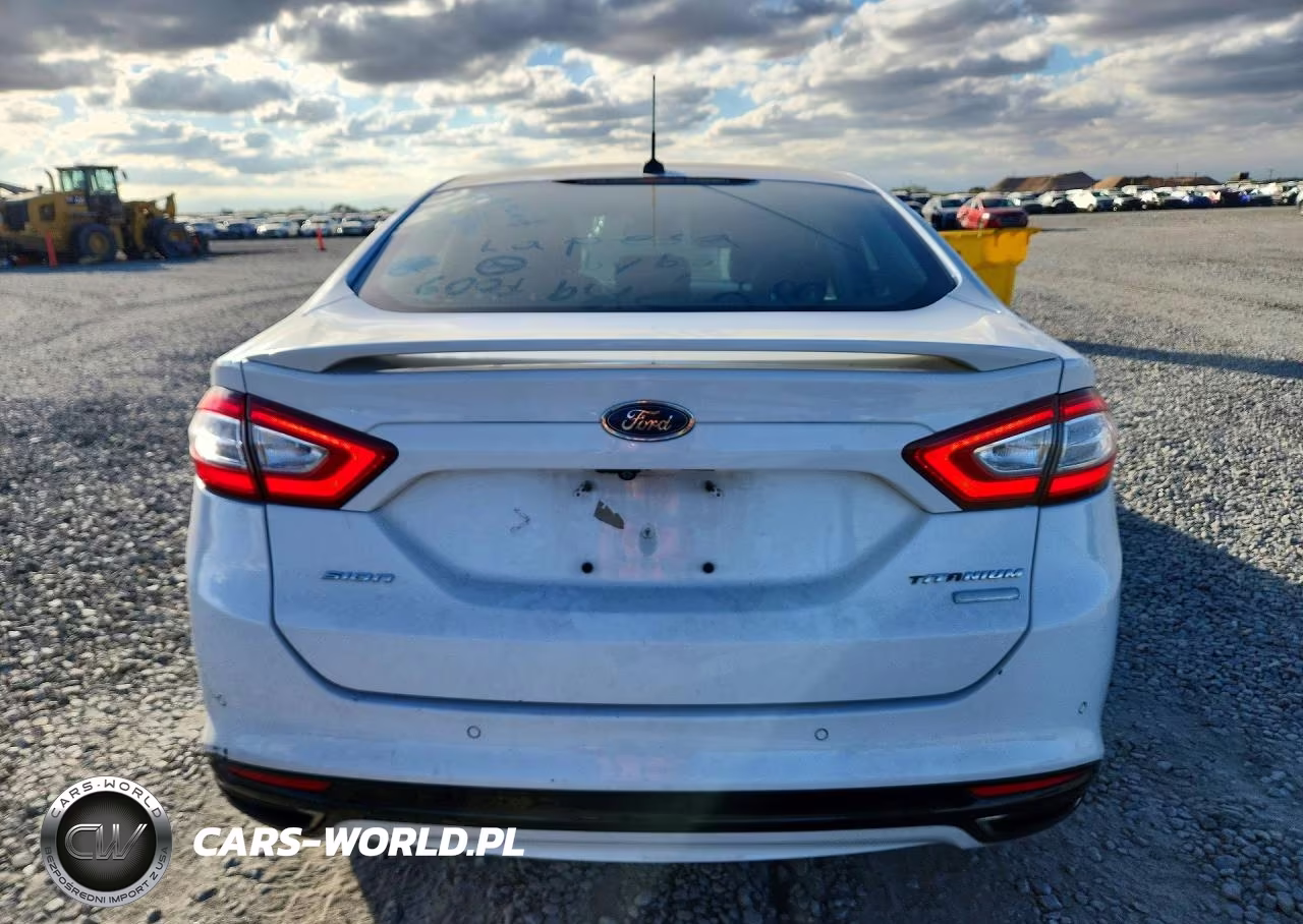 2016 Ford Fusion Titanium VIN:3FA6P0K97GR332230 - 6