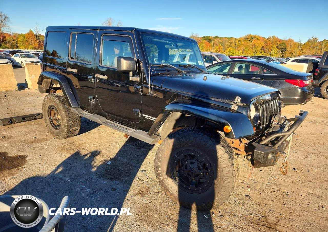 2011 Jeep Wrangler Unlimited Sport VIN:1J4HA3H12BL615417 - 4
