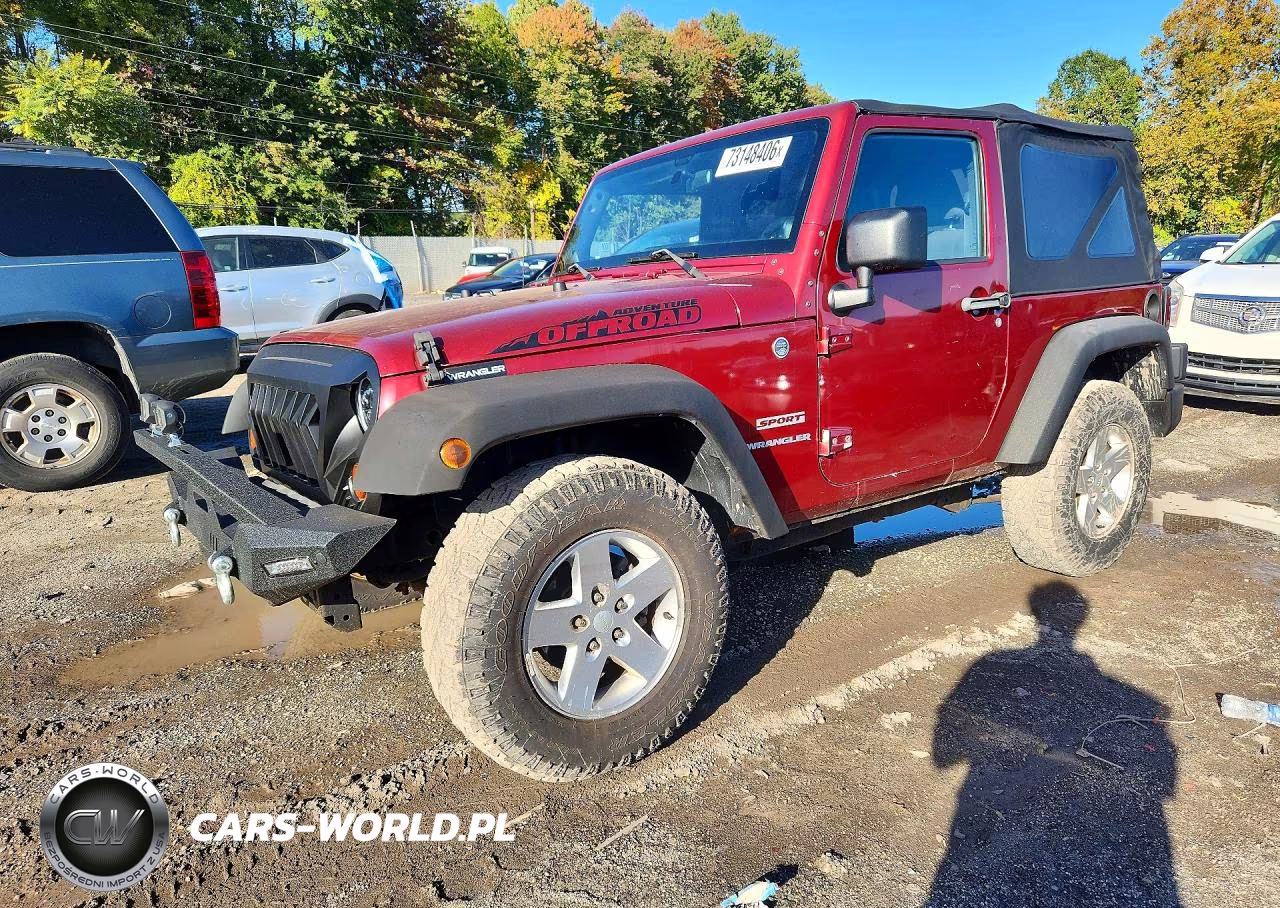 2012 Jeep Wrangler Sport VIN:1C4AJWAG3CL140353 - 1