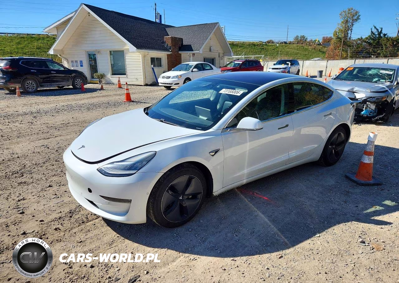 2018 Tesla Model 3 VIN:5YJ3E1EB2JF089054 - 1