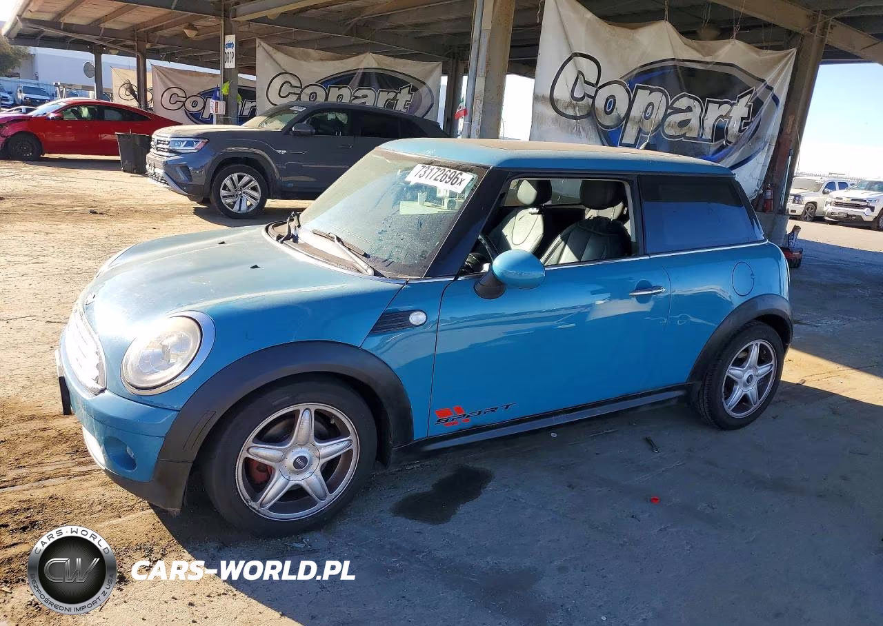 2009 Mini Cooper VIN:WMWMF335X9TW70558 - 1