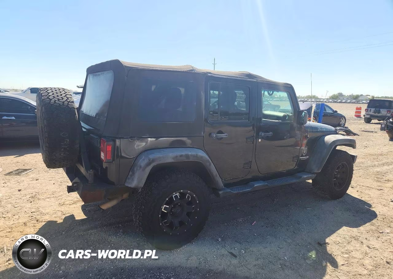 2011 Jeep Wrangler Unlimited Rubicon VIN:1J4HA6H12BL630310 - 3
