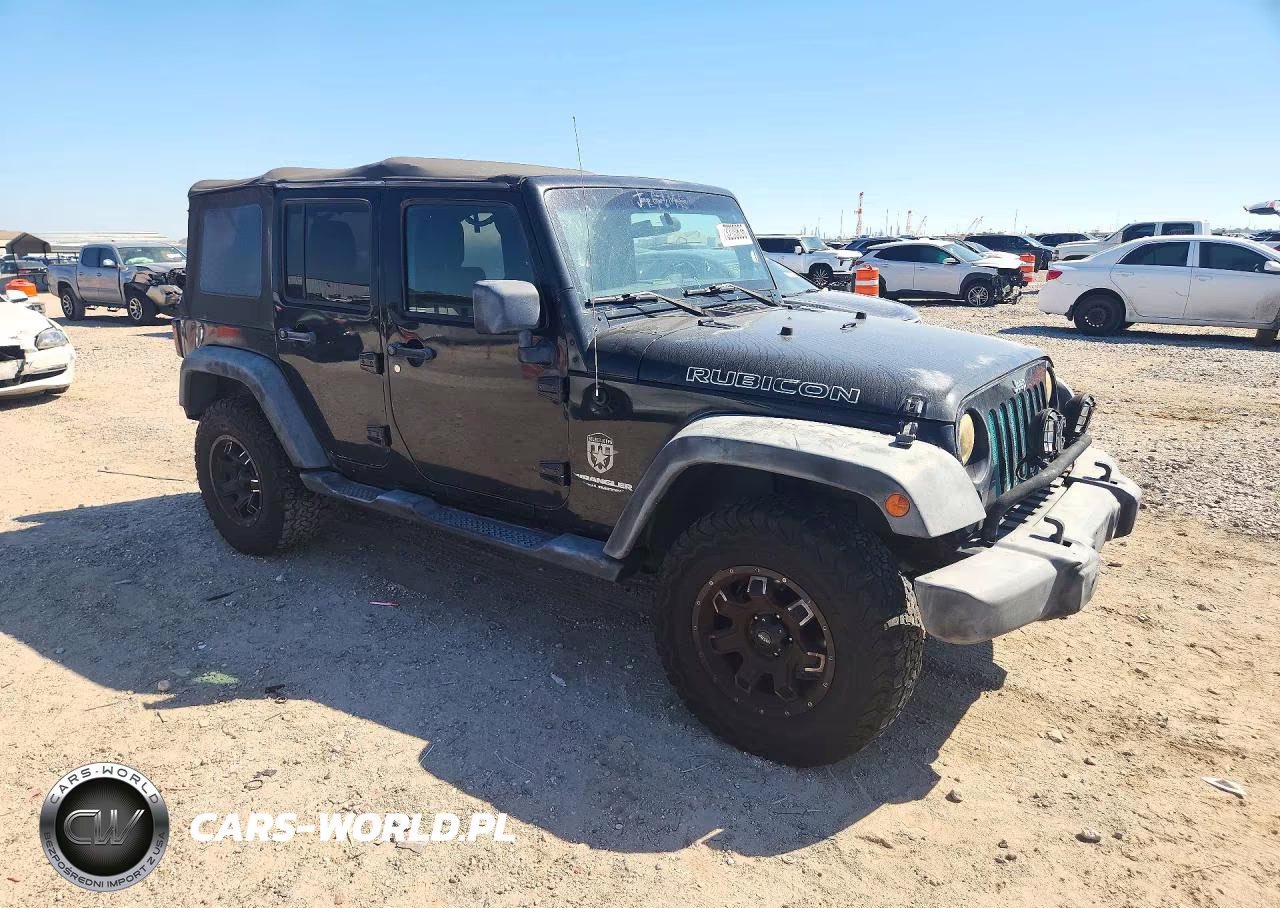 2011 Jeep Wrangler Unlimited Rubicon VIN:1J4HA6H12BL630310 - 4