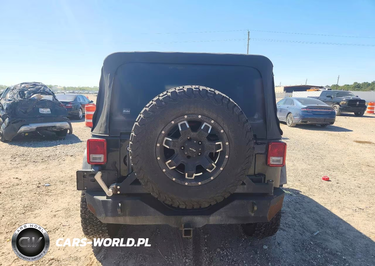 2011 Jeep Wrangler Unlimited Rubicon VIN:1J4HA6H12BL630310 - 6