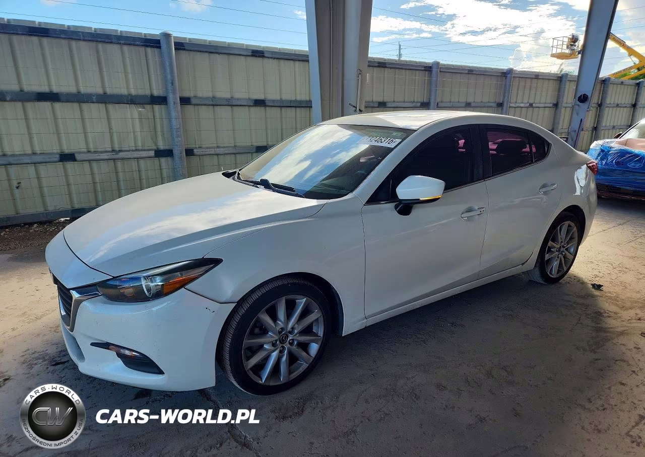 2017 Mazda 3 Touring VIN:3MZBN1V76HM131395 - 1