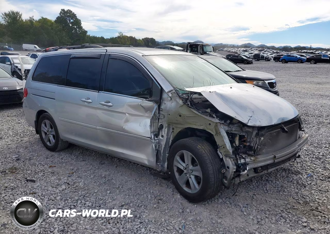 2010 Honda Odyssey Touring VIN:5FNRL3H9XAB090344 - 4