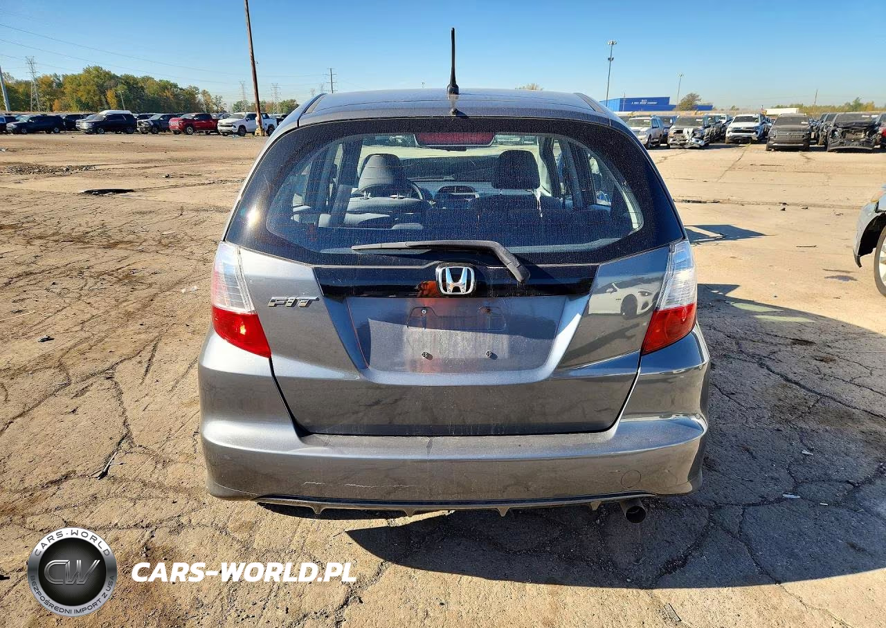 2011 Honda Fit VIN:JHMGE8H38BS008222 - 6