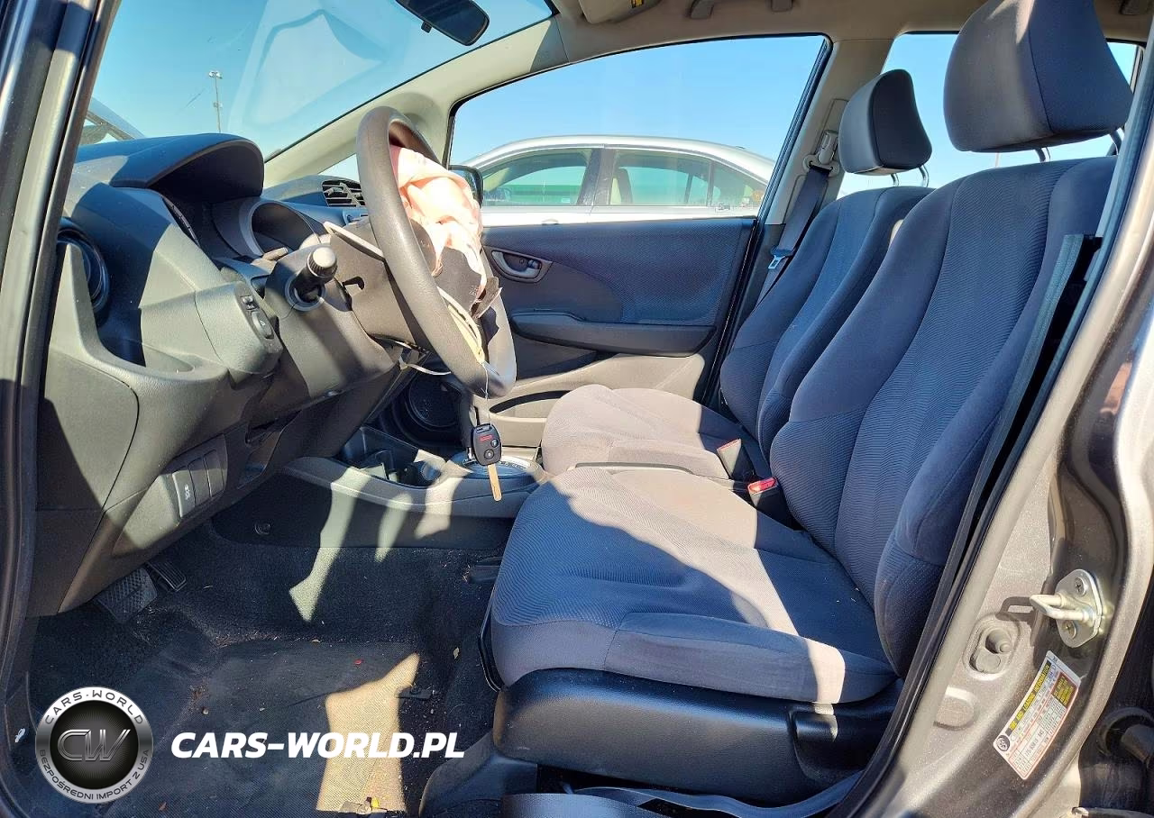2011 Honda Fit VIN:JHMGE8H38BS008222 - 7
