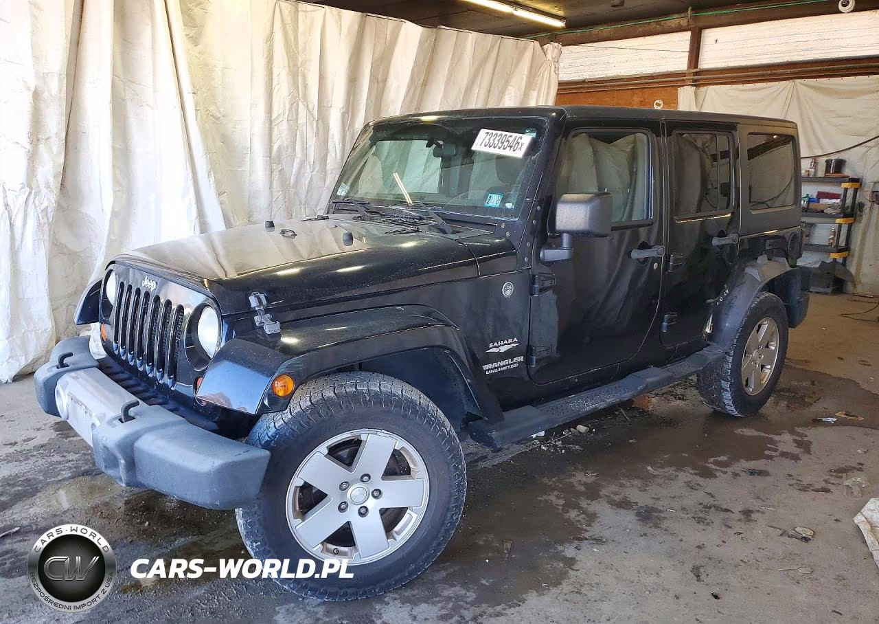 2012 Jeep Wrangler Unlimited Sahara VIN:1C4BJWEG5CL276093 - 1