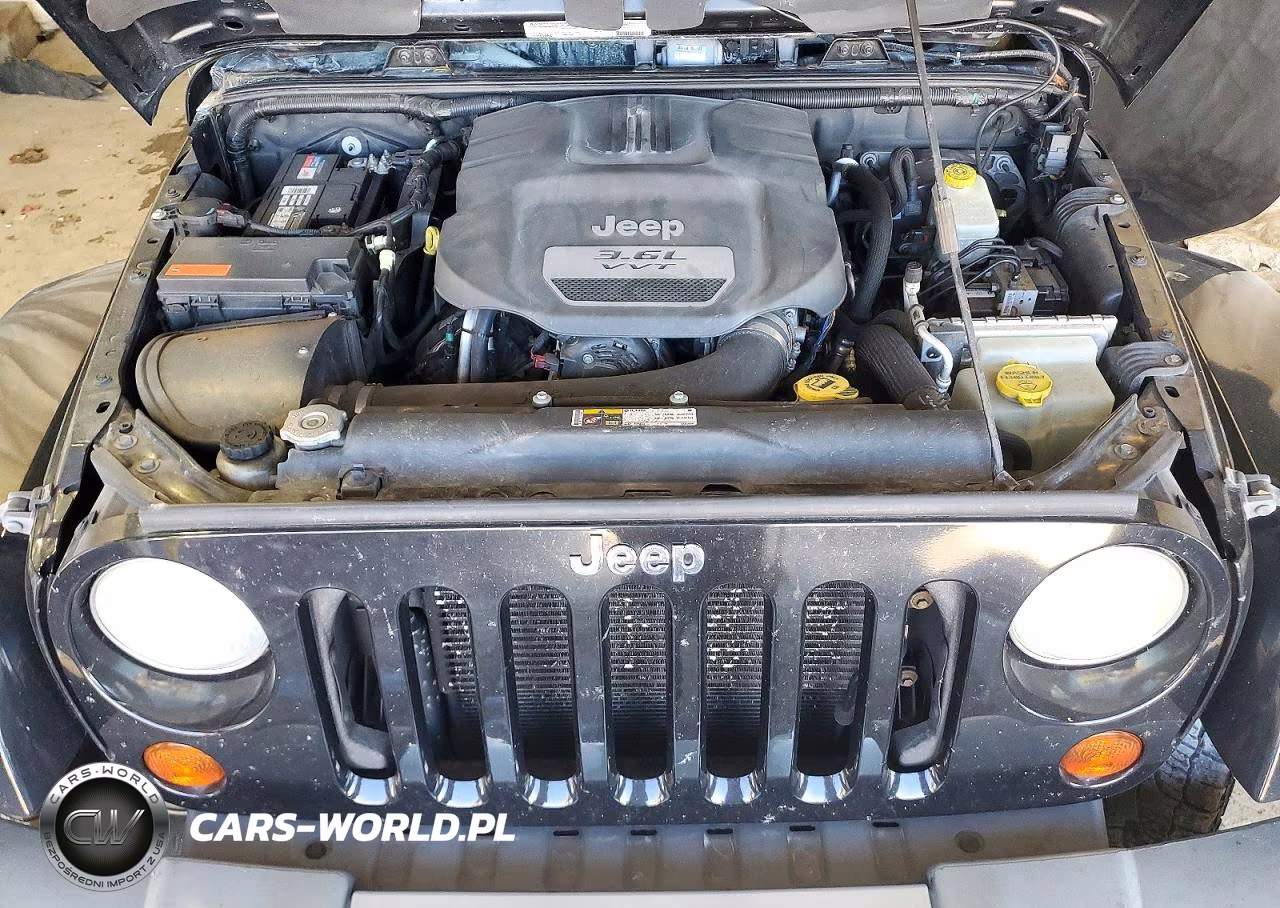 2012 Jeep Wrangler Unlimited Sahara VIN:1C4BJWEG5CL276093 - 12