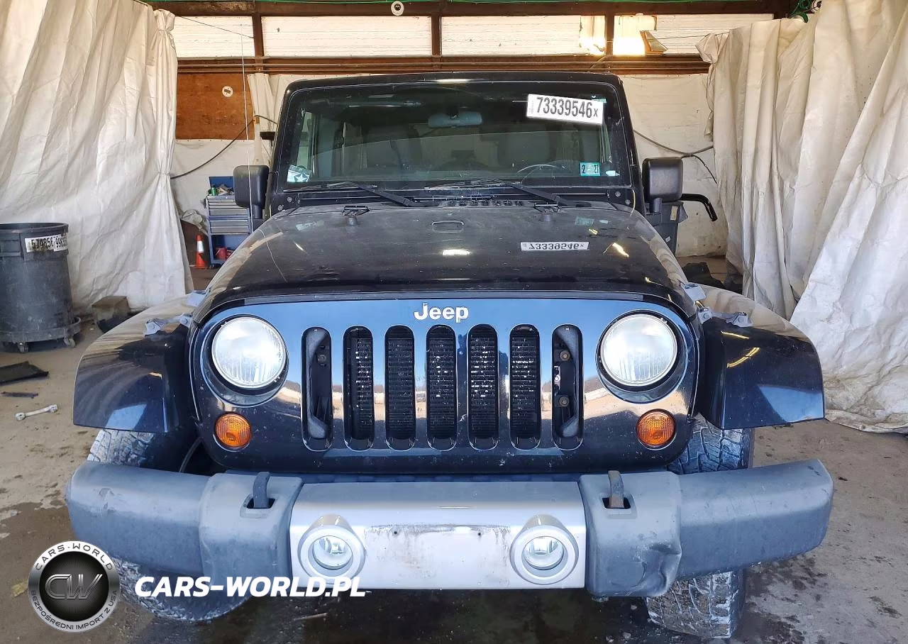 2012 Jeep Wrangler Unlimited Sahara VIN:1C4BJWEG5CL276093 - 5